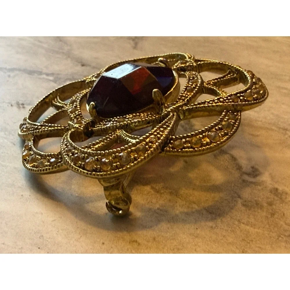 Vintage Monet Gold Tone Red Stone Rhinestone Floral Openwork Brooch Pin